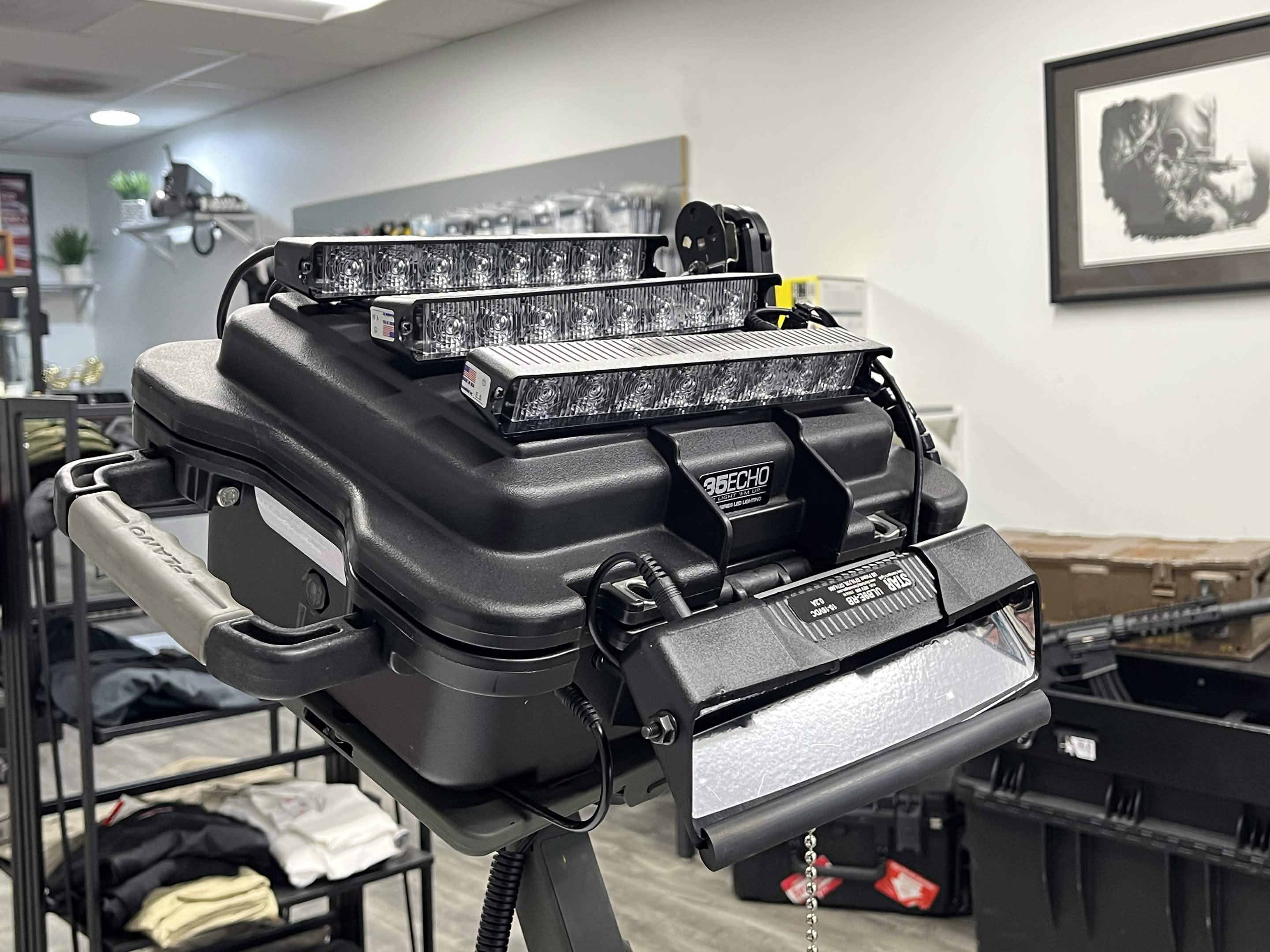 Raptor-X Mobile Siren Kit deployed on tripod with LED light bars